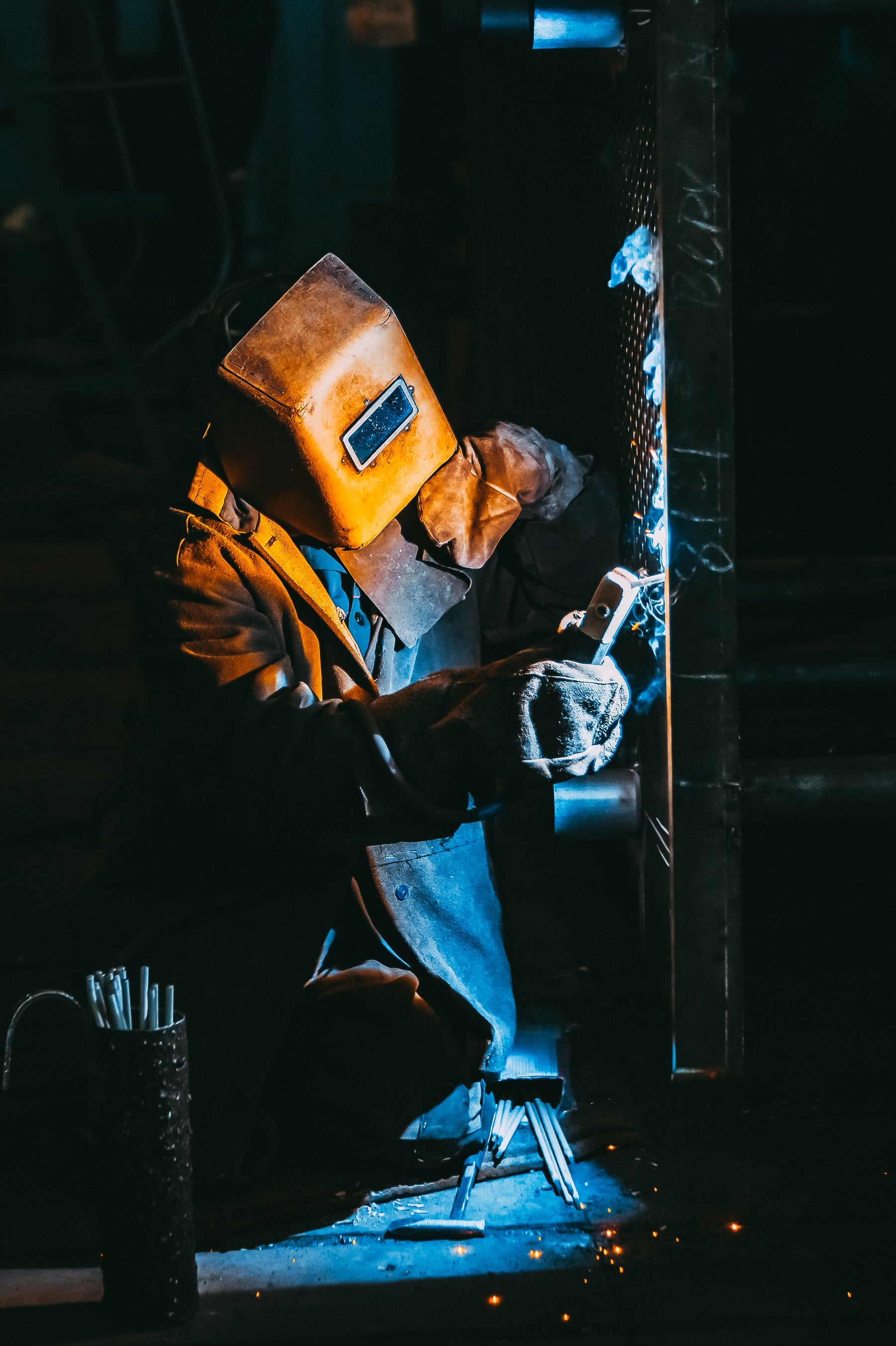 A person doing welding work by wearing essential PPE