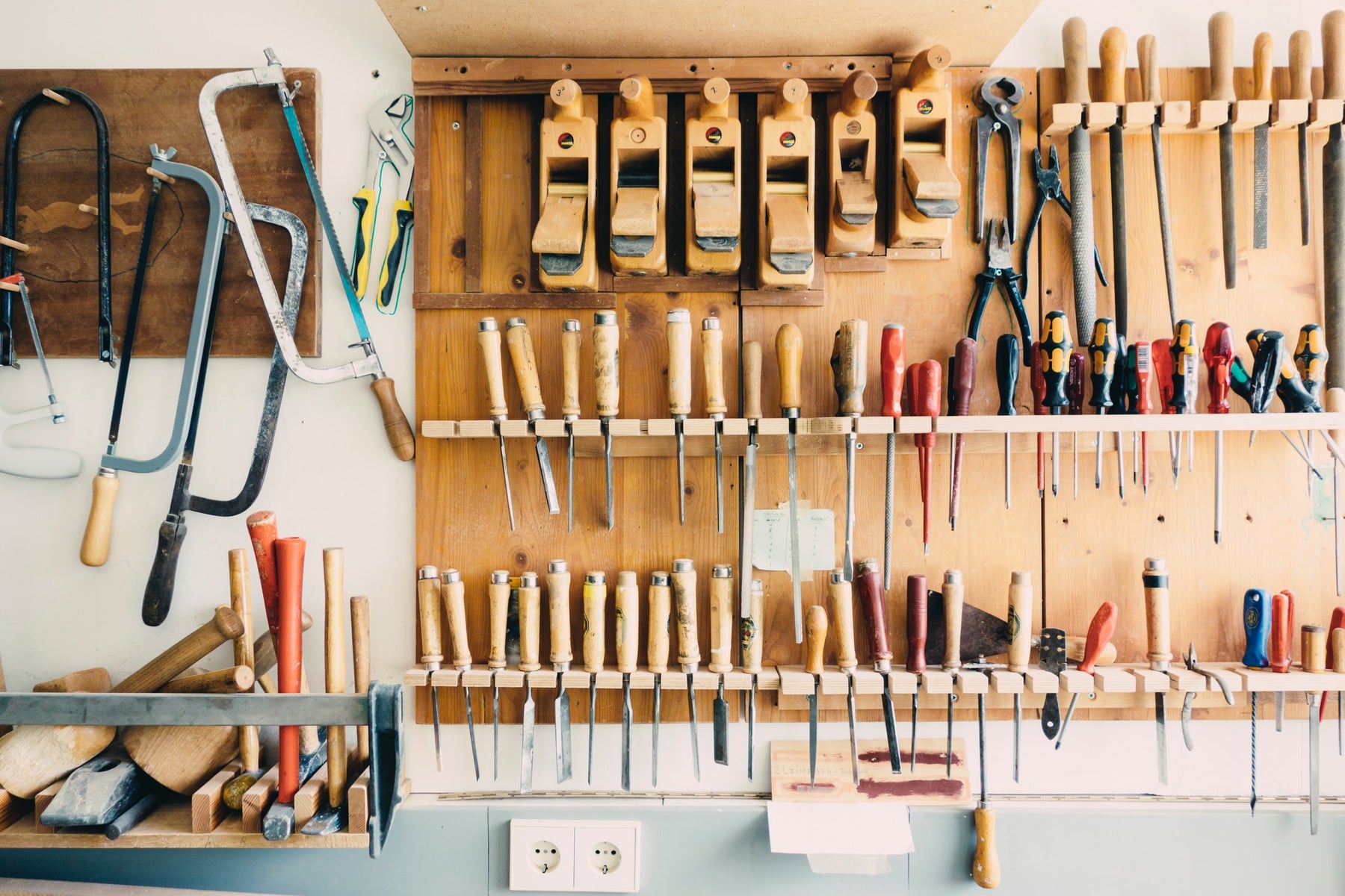 A neatly organized workspace with essential hand tools